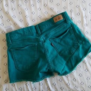 Teal Levi's cutoff shorts